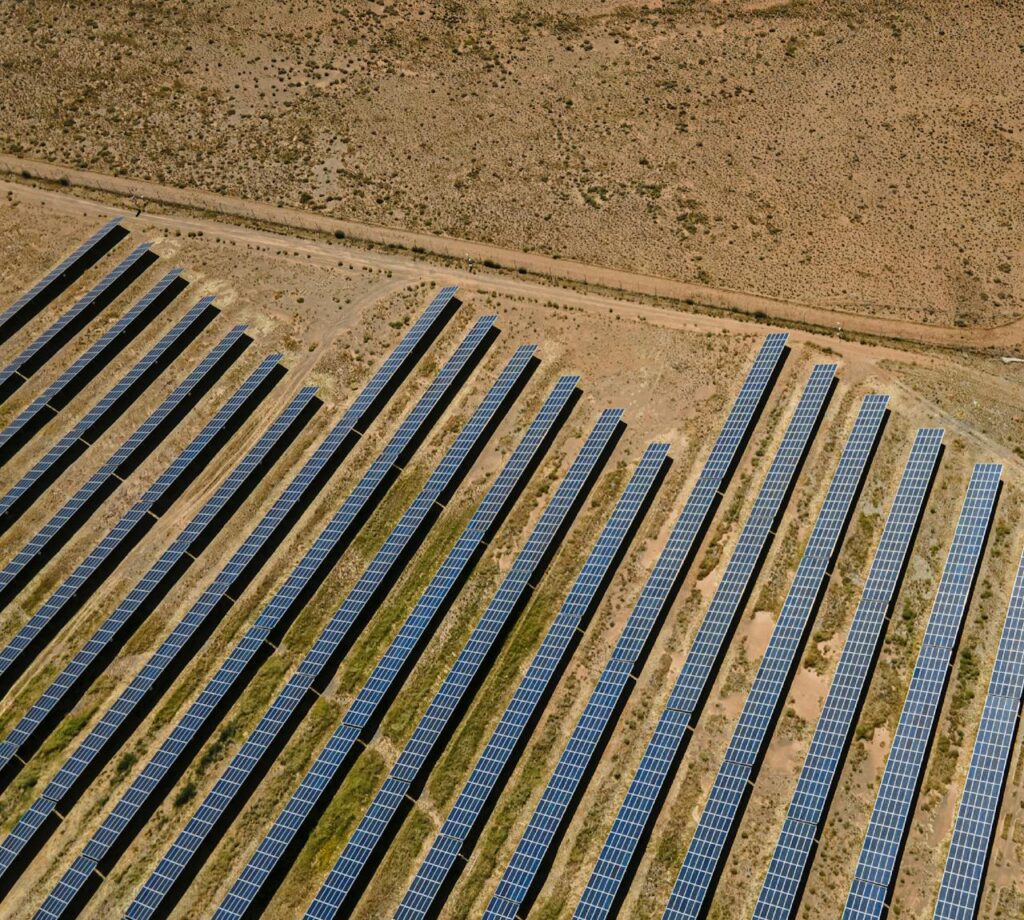 Crafting Captivating Headlines: Your awesome post title goes here Aerial shot of solar panels in De Aar, illustrating sustainable energy in South Africa.