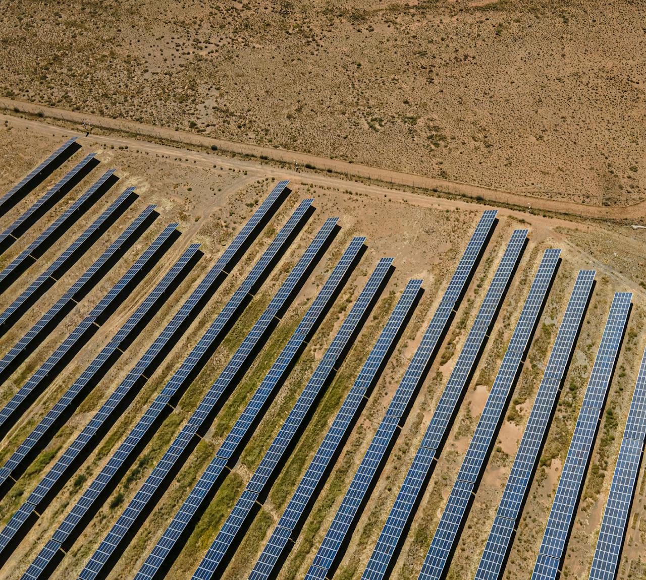 Crafting Captivating Headlines: Your awesome post title goes here Aerial shot of solar panels in De Aar, illustrating sustainable energy in South Africa.